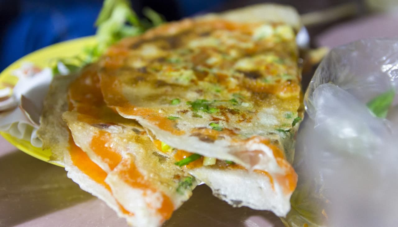Tour nocturno gastronómico en moto por Ciudad Ho Chi Minh - imagen 9