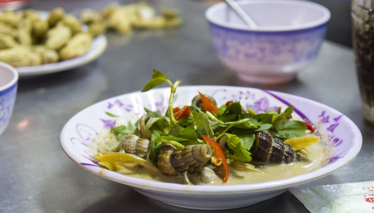Tour nocturno gastronómico en moto por Ciudad Ho Chi Minh - imagen 8